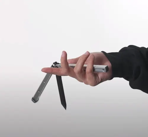 Use a flicking motion of your wrist to swing the bite handle and blade around.